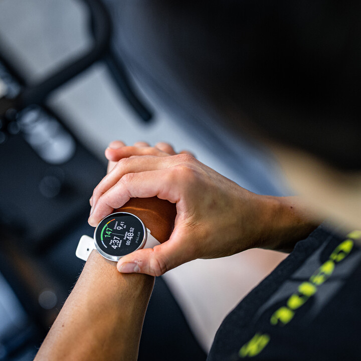 checking heart rate on watch